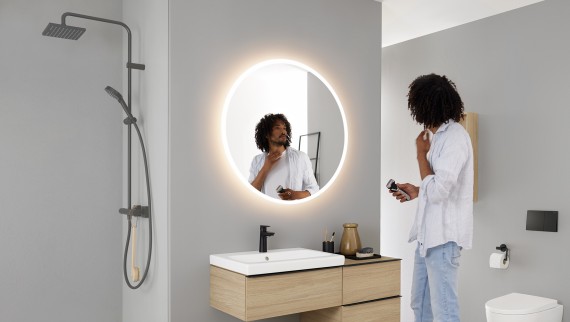 Geberit Option miroir rond avec meubles et céramiques de la série salle de bains Geberit iCon