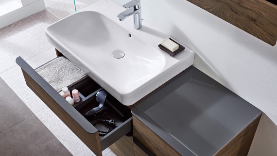 Geberit Smyle washbasin and furniture with opened drawer