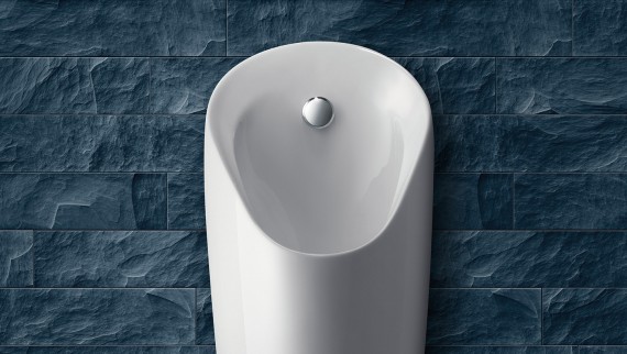 Preda urinal installed on a grey wall (© Geberit) Preda urinal installed on a grey wall (© Geberit)