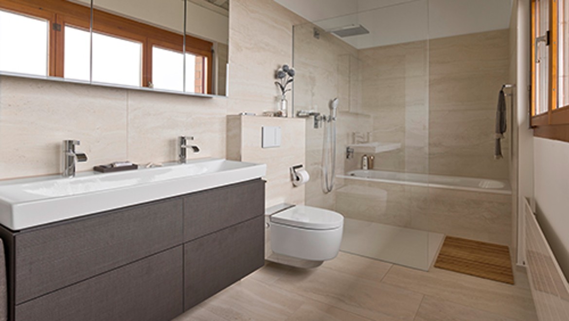Bathroom with Geberit AquaClean shower toilet after renovation Bathroom with Geberit AquaClean shower toilet after renovation